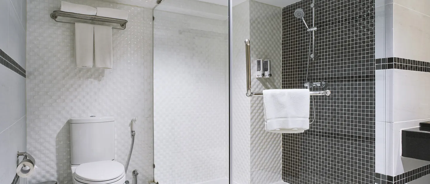 Modern bathroom with walk-in shower and floating vanity