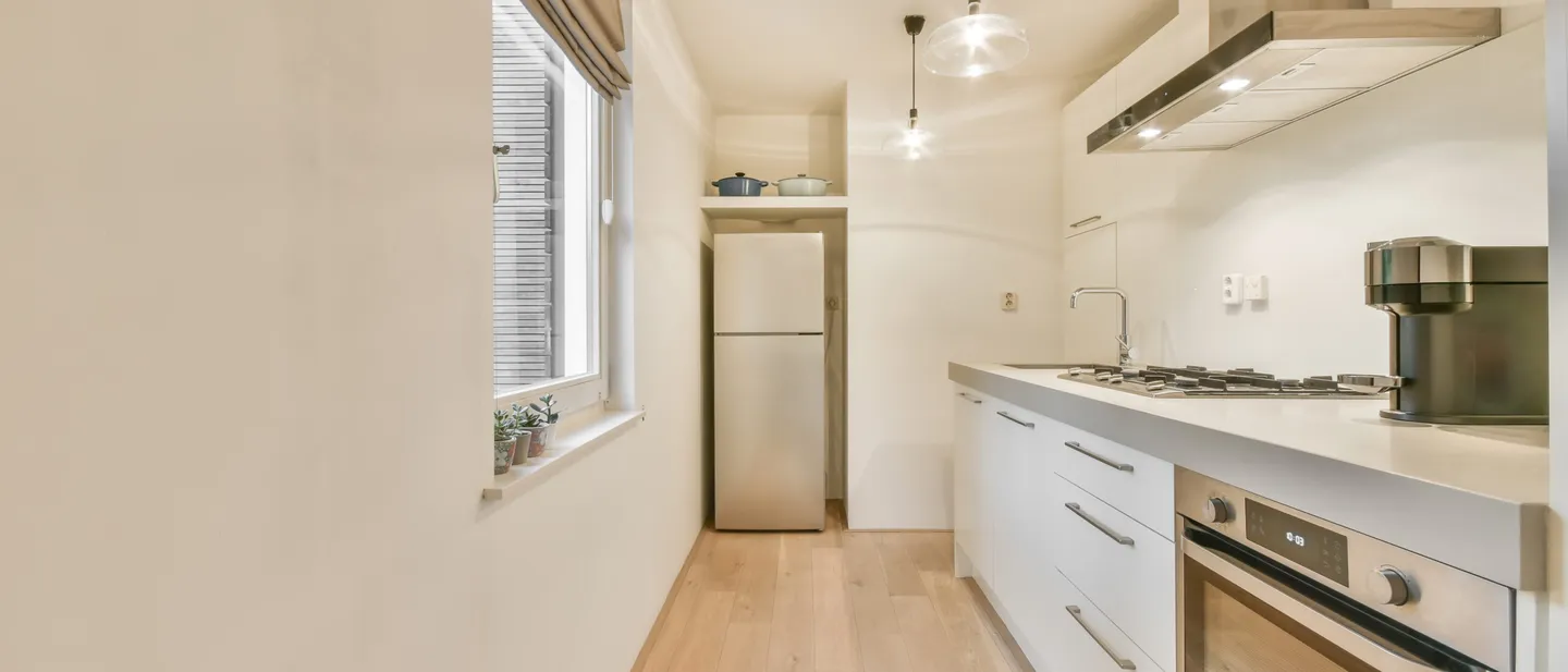 Spacious luxury kitchen with flat-panel cabinets